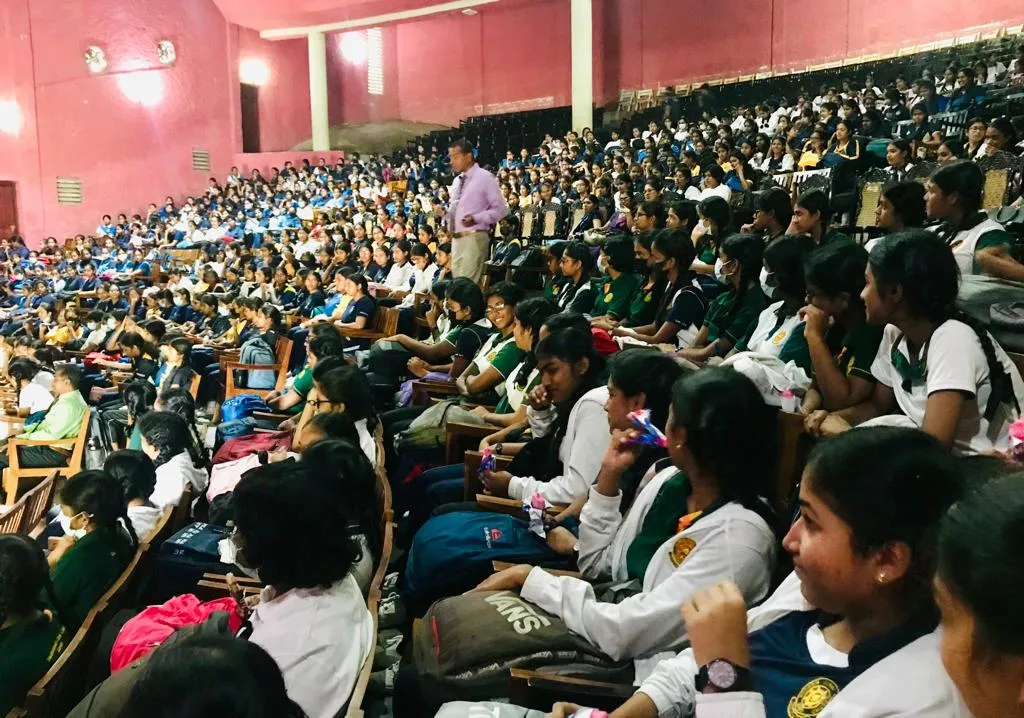 Students attending the O/L counselling workshop at the Dharmaraja College auditorium.