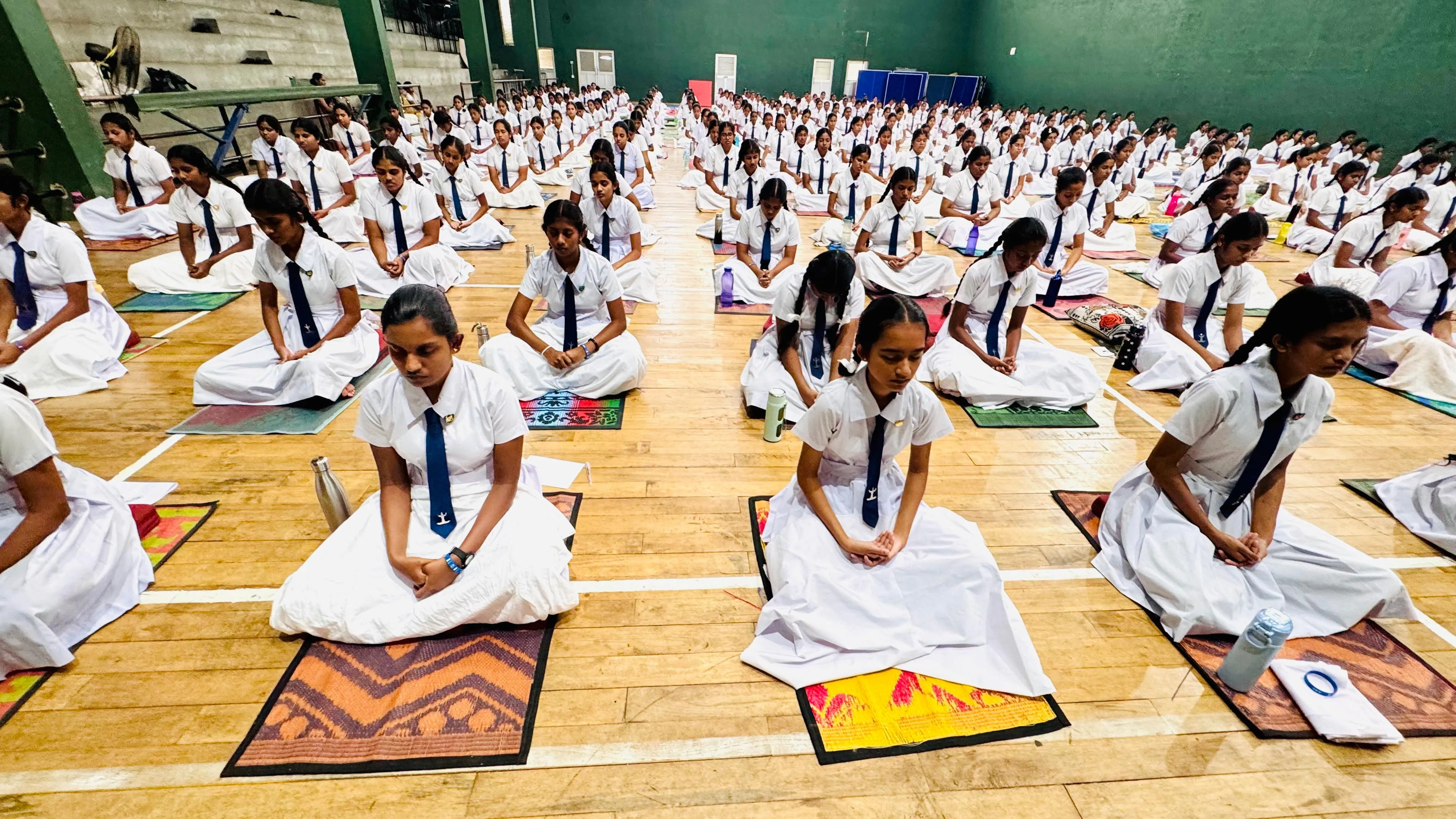 Students meditating during a mindfulness program at Kegalu Balika Vidyalaya.