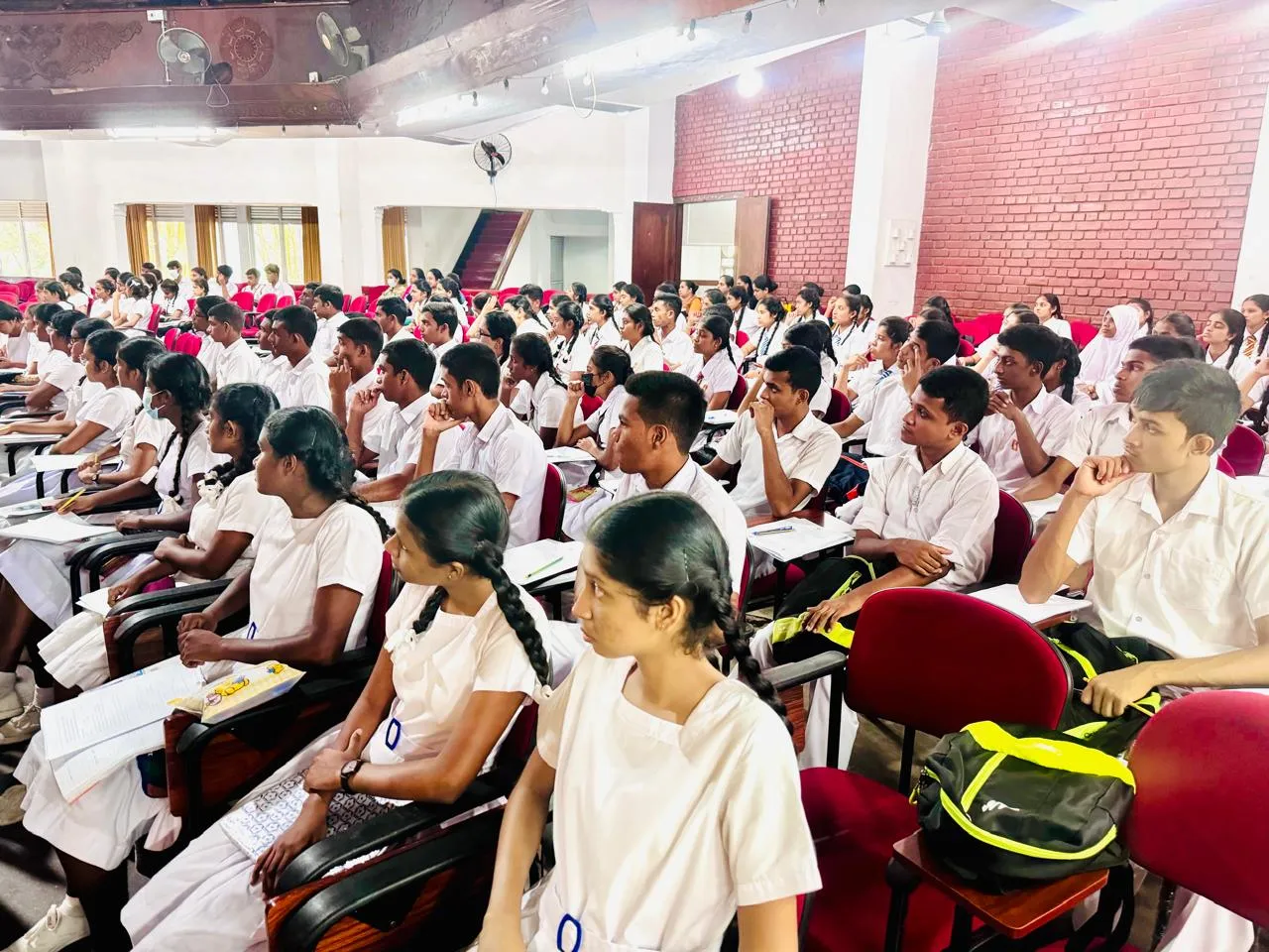 Central Province Advanced Level students listening during the Biosystems Technology workshop.