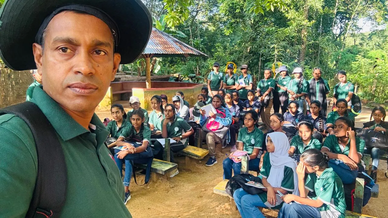 Nayana Pradeep with students of St Andrew’s Balika Vidyalaya seated for the field trip at the Unanagala Forest.